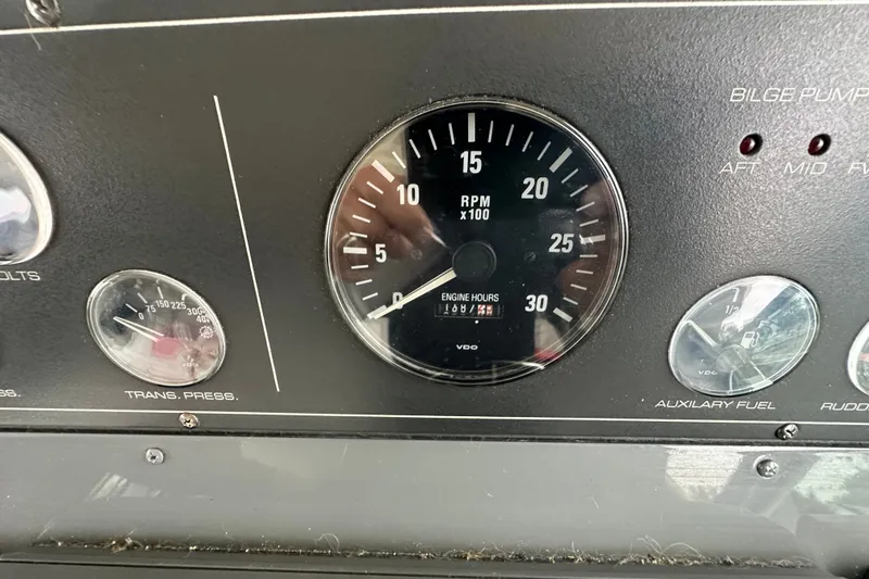 Slide: The Image of Dashboard gauges of a 1997 Tiara Yachts 4000 Express boat. - 37