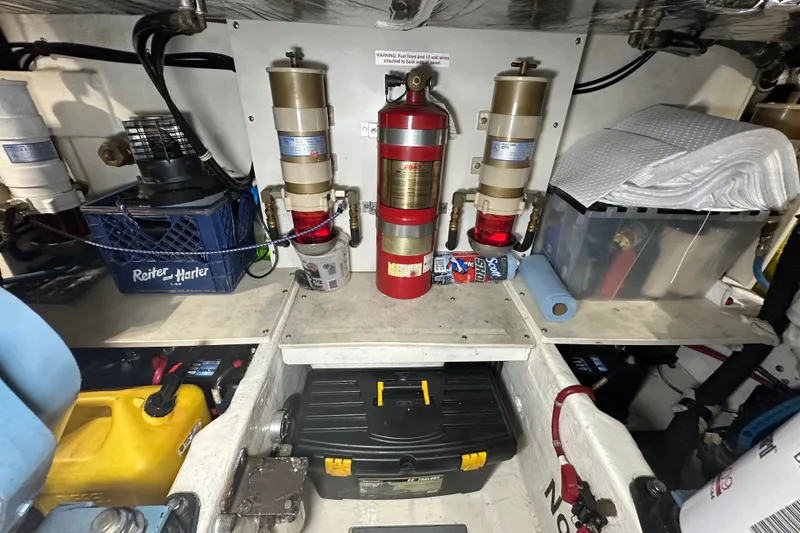 Slide: The Image of Engine room of a 1997 Tiara Yachts 4000 Express with fire suppression system. - 46