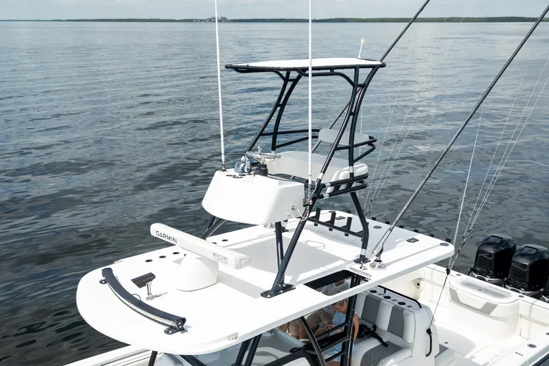 Slide: The Image of 2021 Invincible 39 Open Fisherman boat with elevated helm, on calm waters. - 6