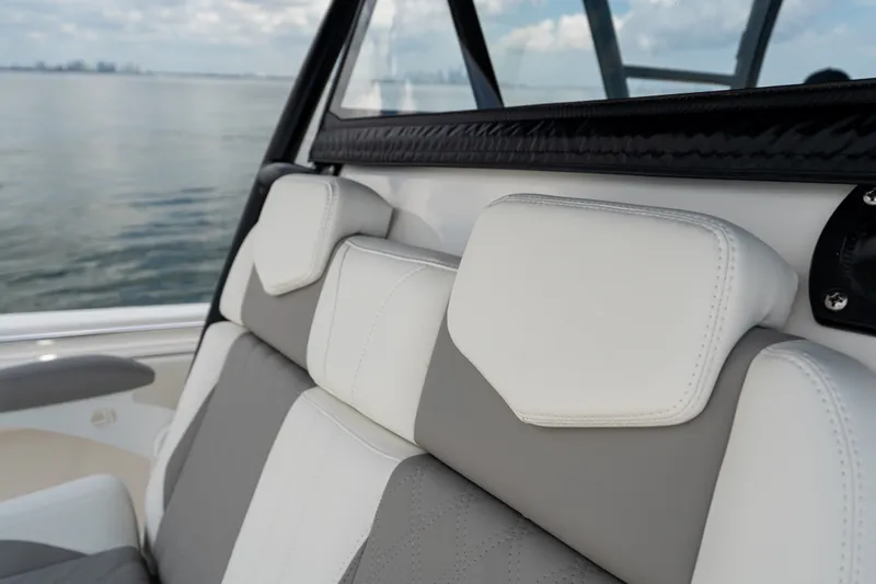 Slide: The Image of 2021 Invincible 39 Open Fisherman boat interior with cushioned seating detail. - 20