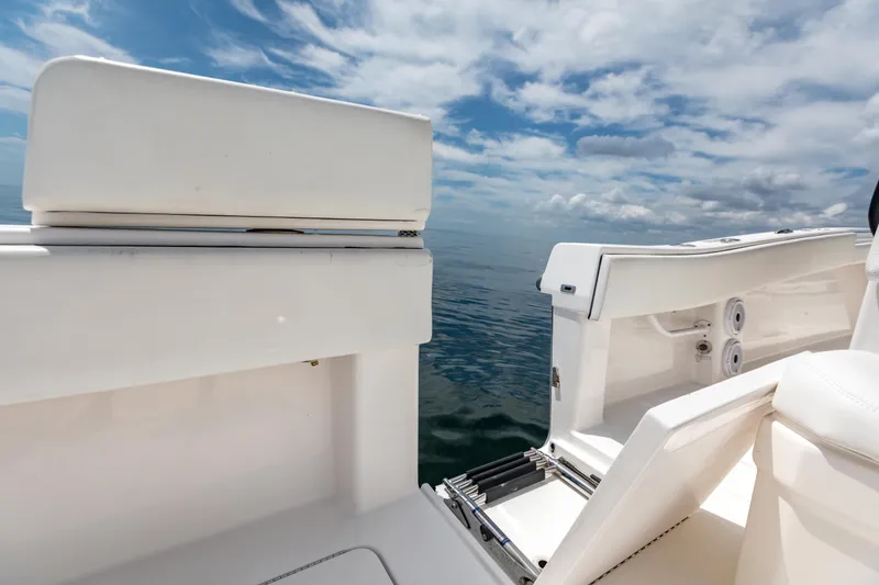 Slide: The Image of 2021 Invincible 39 Open Fisherman boat interior with ocean view and clear sky. - 56