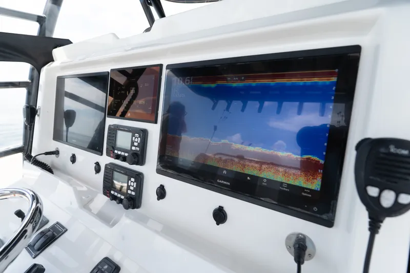 Slide: The Image of Dashboard of 2021 Invincible 39 Open Fisherman with advanced navigation displays. - 41