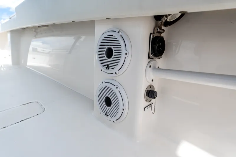 Slide: The Image of 2021 Invincible 39 Open Fisherman boat speakers and controls on deck. - 16