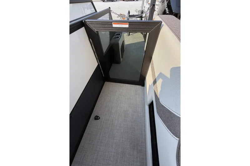 Slide: The Image of Interior view of 2027 Alera M25L boat with modern seating and flooring. - 17