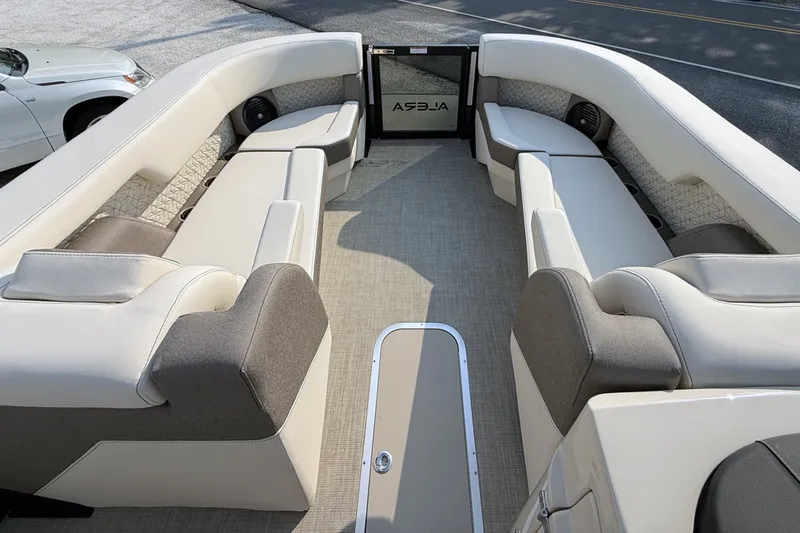Slide: The Image of Luxurious interior of 2027 Alera M25L boat with plush seating and modern design. - 12