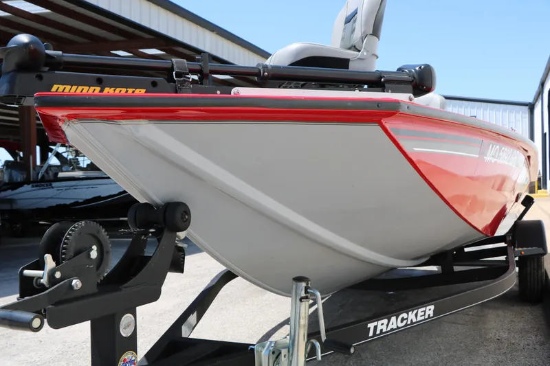 Slide: The Image of 2018 Tracker Pro Team 175 TXW boat on trailer, featuring red and gray design. - 15