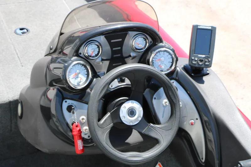 Slide: The Image of 2018 Tracker Pro Team 175 TXW dashboard with steering wheel and gauges. - 33
