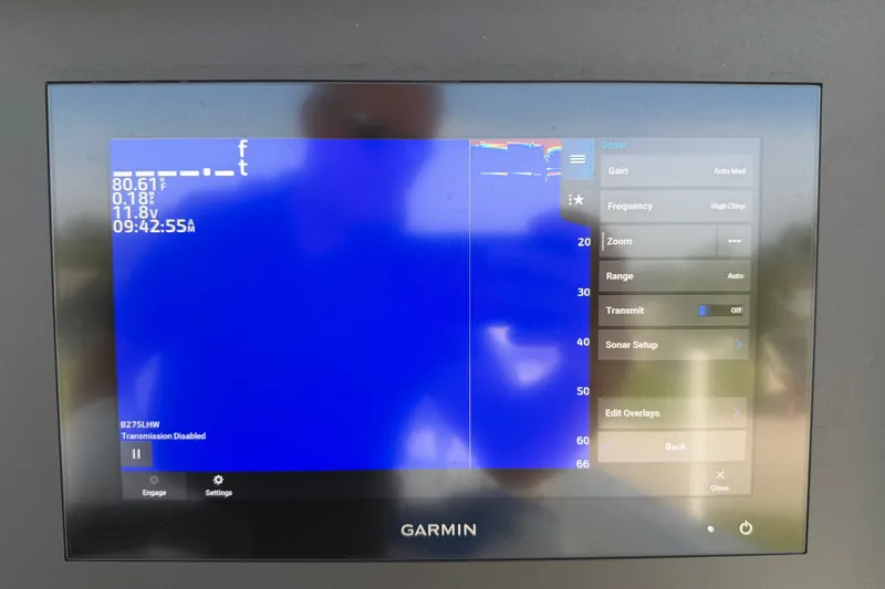 Slide: The Image of Garmin sonar display on 2024 Bluewater BW 25T boat, showing settings and data. - 39