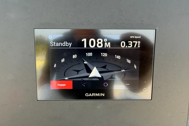 Slide: The Image of Garmin display on 2024 Bluewater BW 25T showing standby mode and GPS speed. - 41