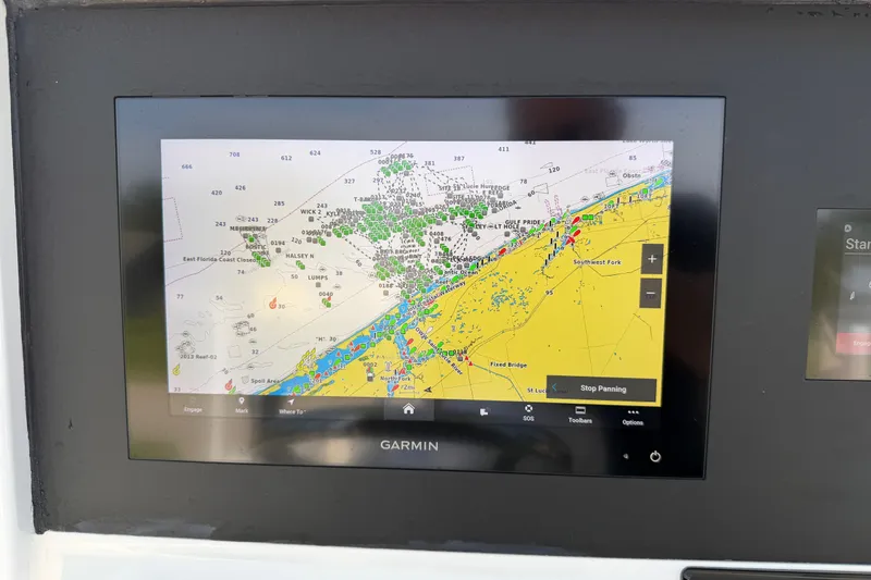 Slide: The Image of Garmin navigation display on 2024 Bluewater BW 25T boat, showing detailed marine chart. - 42