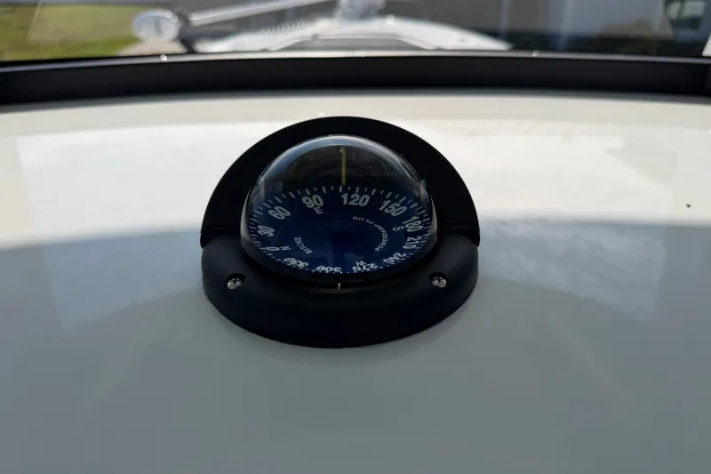 Slide: The Image of Compass on 2024 Bluewater BW 25T boat dashboard, indicating direction. - 40