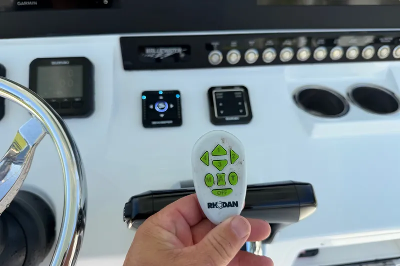 Slide: The Image of Control panel of 2024 Bluewater BW 25T boat with Rhodan remote. - 36