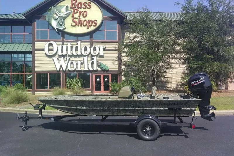 The Image of 2027 Tracker Grizzly 1754 SC boat outside Bass Pro Shops Outdoor World. - 0
