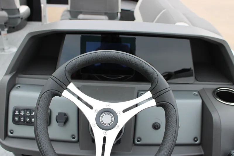Slide: The Image of Steering console of 2027 Sun Tracker Fishin' Barge 20 DLX pontoon boat. - 32