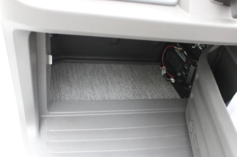 Slide: The Image of Storage compartment of 2027 Sun Tracker Fishin' Barge 20 DLX with wiring details. - 33