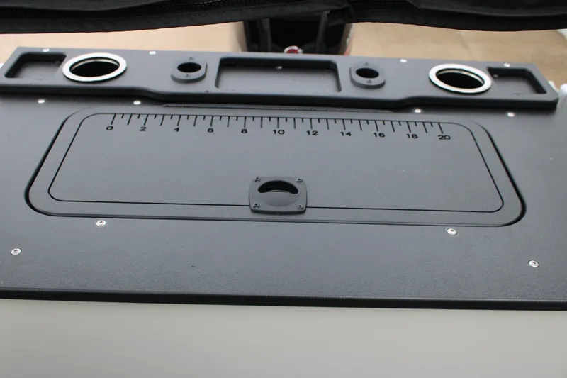 Slide: The Image of 2027 Sun Tracker Fishin' Barge 20 DLX fishing station with built-in ruler and cup holders. - 24