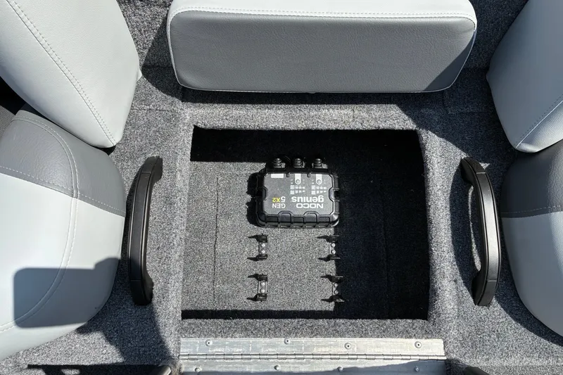 Slide: The Image of 2027 Tracker Pro Team 195 boat interior with NOCO Genius battery charger. - 14