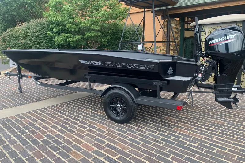 The Image of 2027 Tracker Grizzly 1756 T Marsh boat with Mercury engine on a trailer. - 0