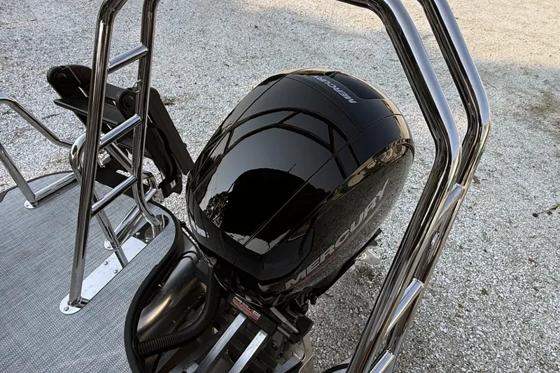 Slide: The Image of Alera A20L 2027 boat with Mercury outboard motor and stainless steel ladder. - 20