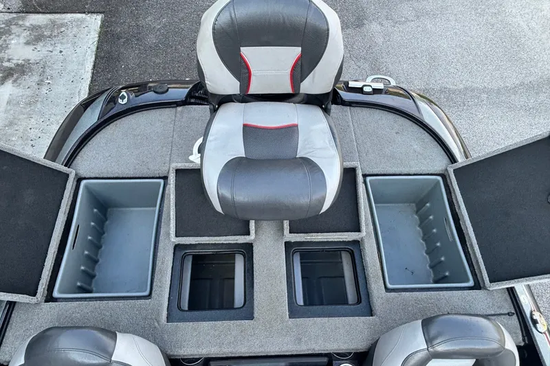 Slide: The Image of 2014 Nitro Z-8 boat interior with storage compartments and seating. - 15