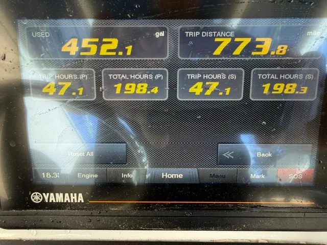 Slide: The Image of Yamaha display shows 452.1 gallons used and 773.8 miles trip distance. - 13