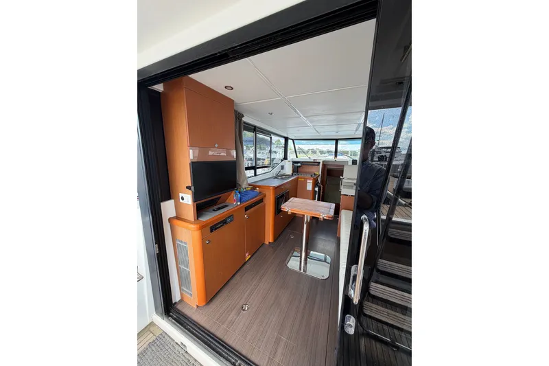 Slide: The Image of Interior view of 2017 Beneteau Swift Trawler 30, featuring modern amenities and sleek design. - 37