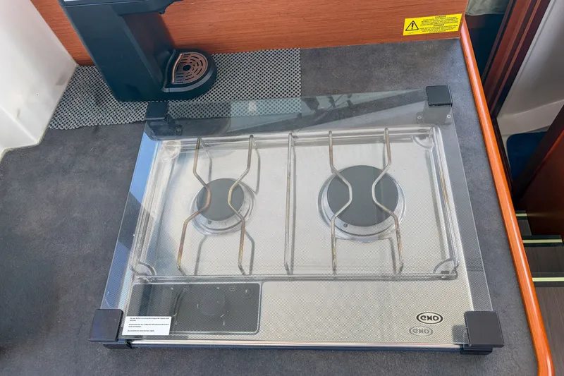 Slide: The Image of Two-burner stove on 2017 Beneteau Swift Trawler 30 yacht kitchen counter. - 56