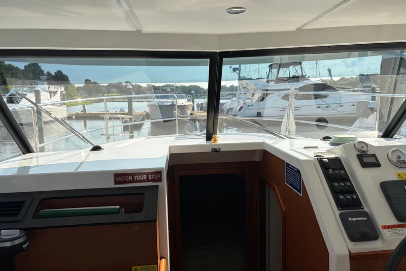 Slide: The Image of Interior view of 2017 Beneteau Swift Trawler 30 at marina dock. - 33