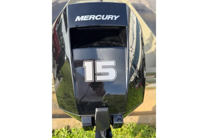 Slide: The Image of Mercury 15 horsepower outboard motor on 2025 Tracker Grizzly 1436 boat. - 14