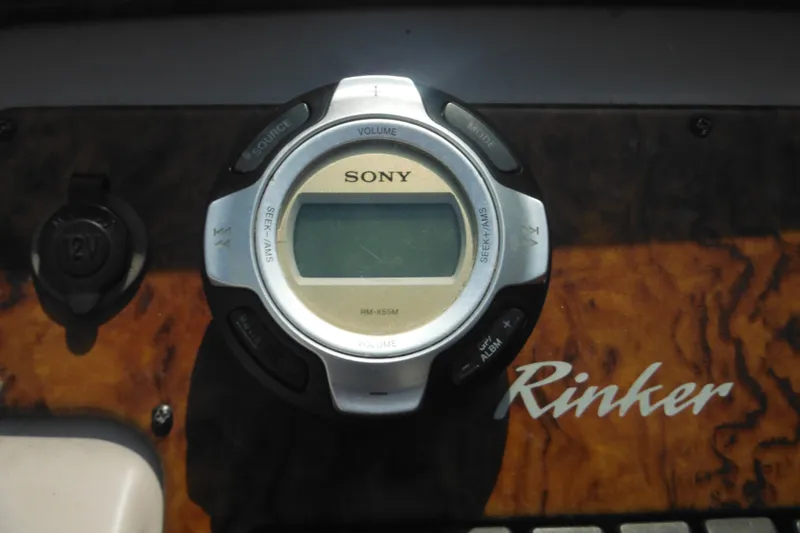 Slide: The Image of Sony audio control panel on 2005 Rinker Fiesta Vee 250 boat dashboard. - 25