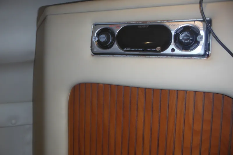 Slide: The Image of 2005 Rinker Fiesta Vee 250 interior with Sony stereo system. - 37
