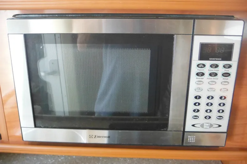 Slide: The Image of Emerson microwave oven with digital controls, installed in a 2005 Rinker Fiesta Vee 250 boat. - 41