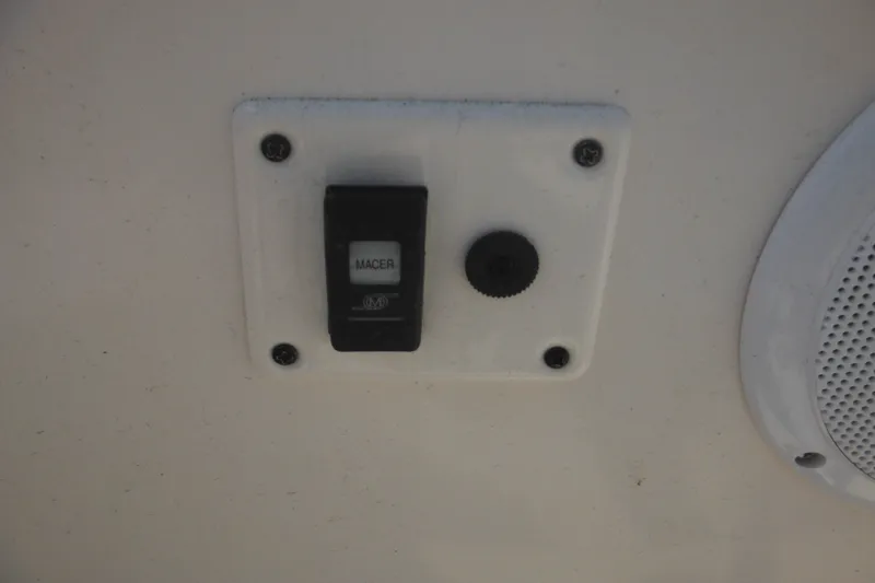 Slide: The Image of Control panel on a 2005 Rinker Fiesta Vee 250 boat. - 15
