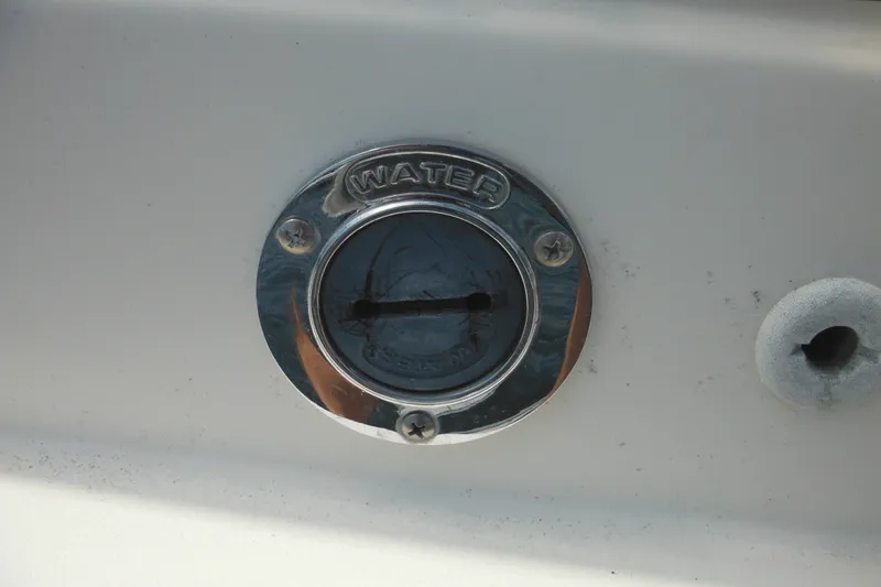 Slide: The Image of Water inlet on 2005 Rinker Fiesta Vee 250 boat. - 60
