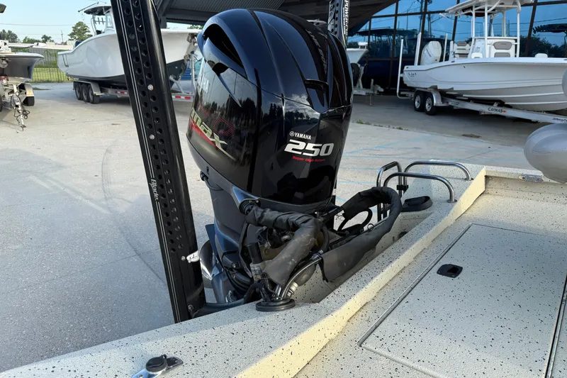 Slide: The Image of 2015 Xpress H24 Bay boat with Yamaha 250 engine at a marina. - 19