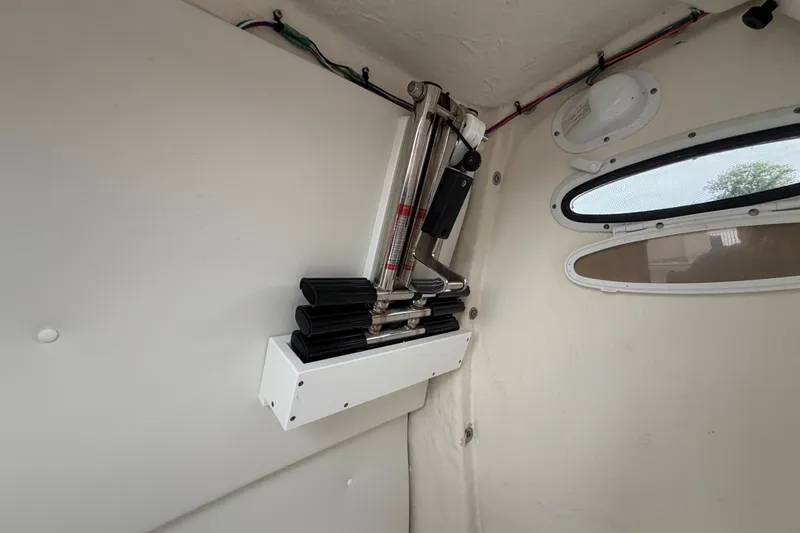 Slide: The Image of Interior view of 2023 Tidewater 282 CC Adventure Bluewater boat, featuring mounted equipment. - 27