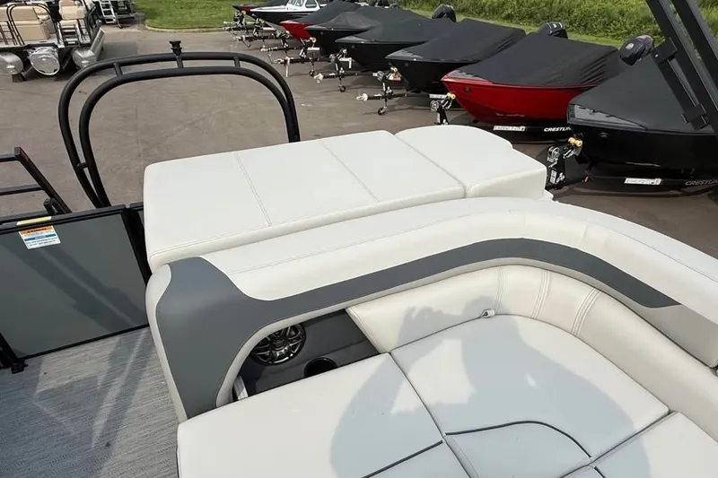 Slide: The Image of 2027 Godfrey Sweetwater 2086 C pontoon boat interior with plush seating and sleek design. - 14