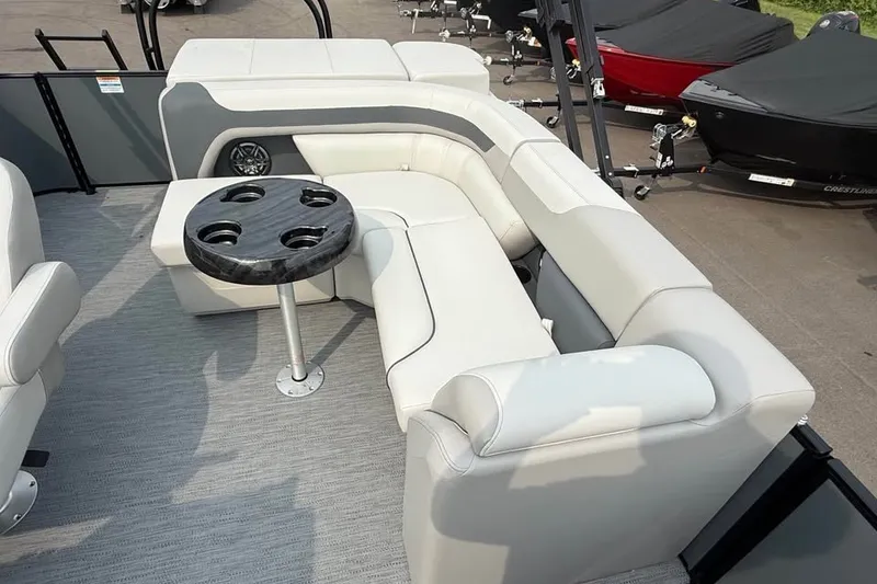 Slide: The Image of Luxurious seating area on 2027 Godfrey Sweetwater 2086 C pontoon boat with cup holders. - 13