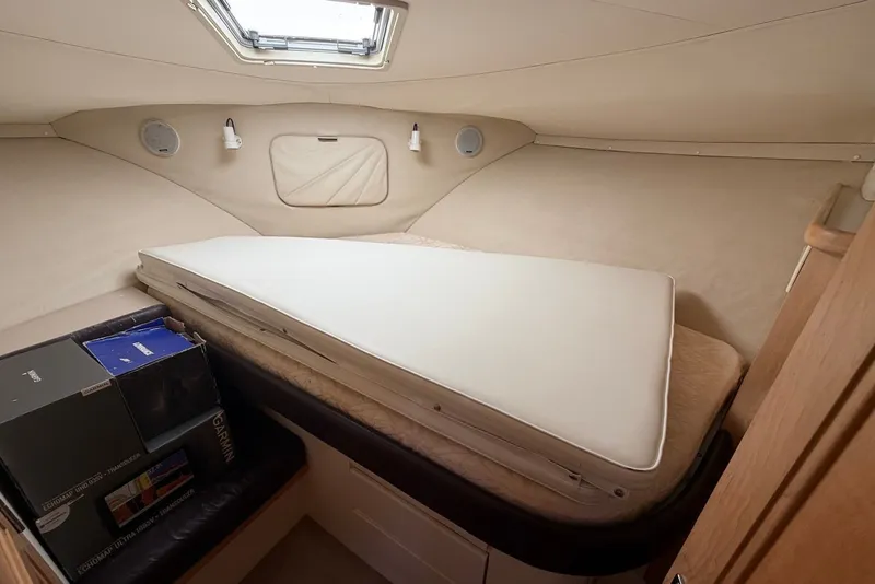 Slide: The Image of Interior cabin of 1996 Carver 370 Aft Cabin Motor Yacht with bed and storage. - 20
