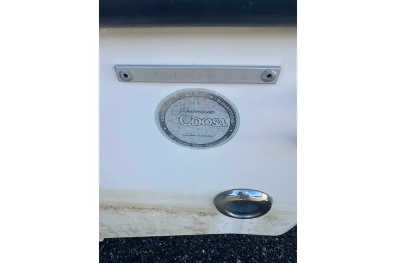 Slide: The Image of 2005 Sea Hunt Triton 220 boat with Coosa Premium label and identification plate. - 4