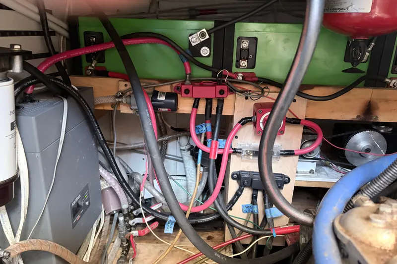 Slide: The Image of Electrical system inside a 1979 Marine Trader 36 boat, featuring wiring and components. - 50
