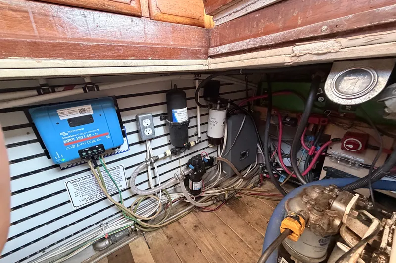 Slide: The Image of Electrical and mechanical systems inside a 1979 Marine Trader 36 boat. - 51