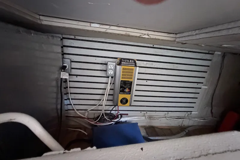 Slide: The Image of Electrical panel and wiring inside a 1979 Marine Trader 36 boat. - 53