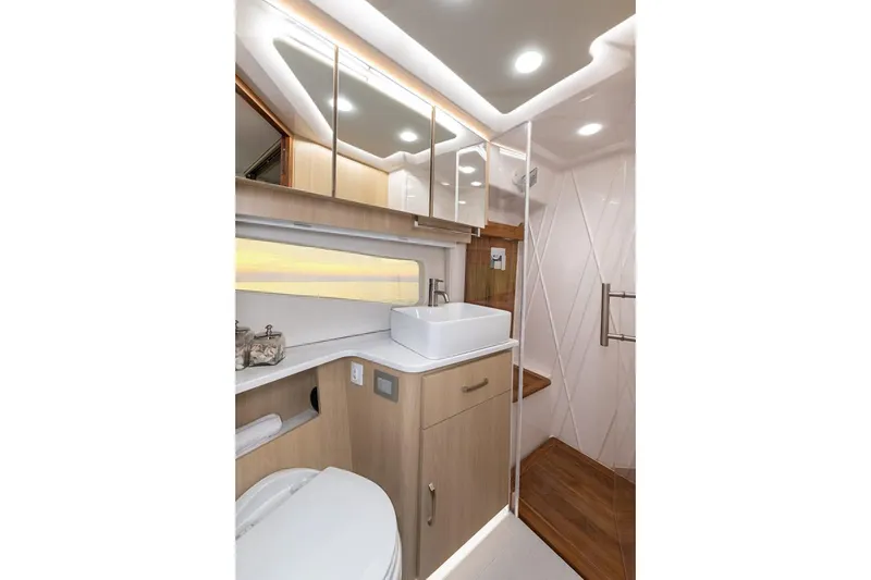Slide: The Image of Manufacturer Provided Image: Luxurious bathroom interior of 2026 Regal 42 XO yacht, featuring modern fixtures and elegant design. - 14