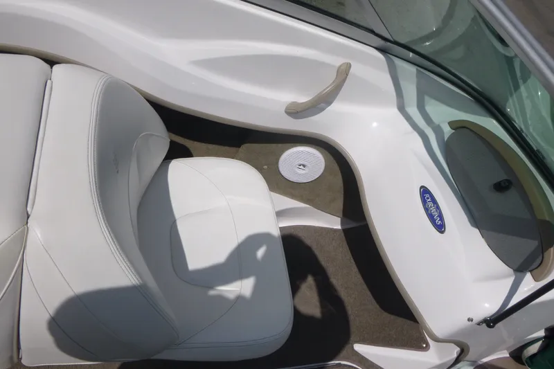 Slide: The Image of Interior of 2007 Four Winns 180 Horizon boat with white seating and dashboard. - 9