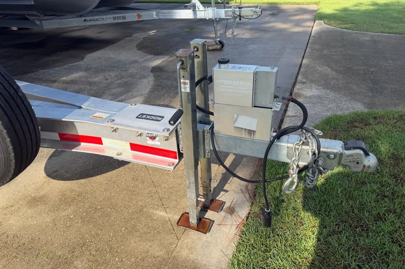 Slide: The Image of Trailer hitch with hydraulic brake actuator for Everglades 335 Center Console, 2021 model. - 27