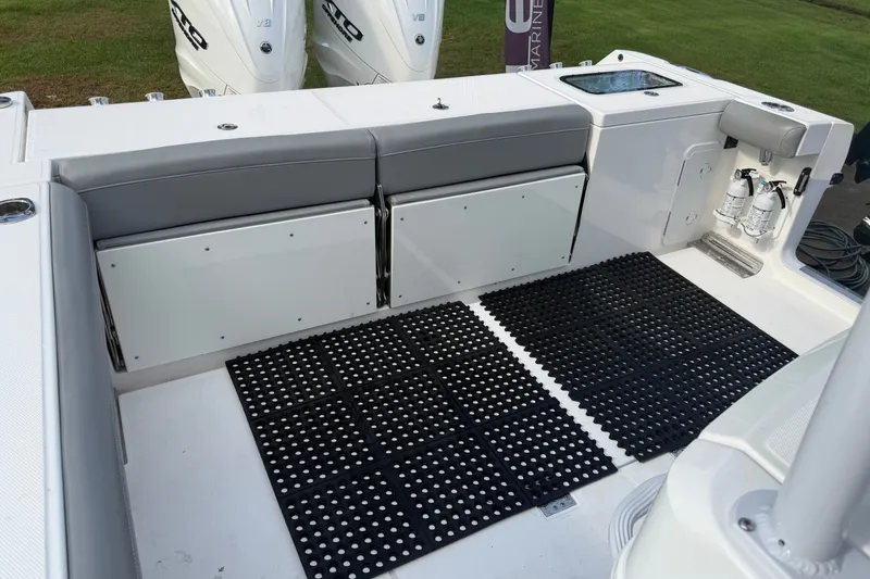 Slide: The Image of 2021 Everglades 335 Center Console boat interior with seating and safety equipment. - 8