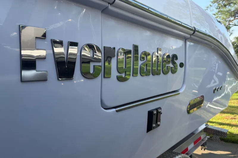 Slide: The Image of Side view of a 2021 Everglades 335 Center Console boat with logo. - 3