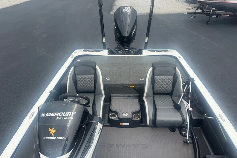 Slide: The Image of 2020 Caymas CX 20 PRO boat interior with Mercury engine and dual seats. - 14