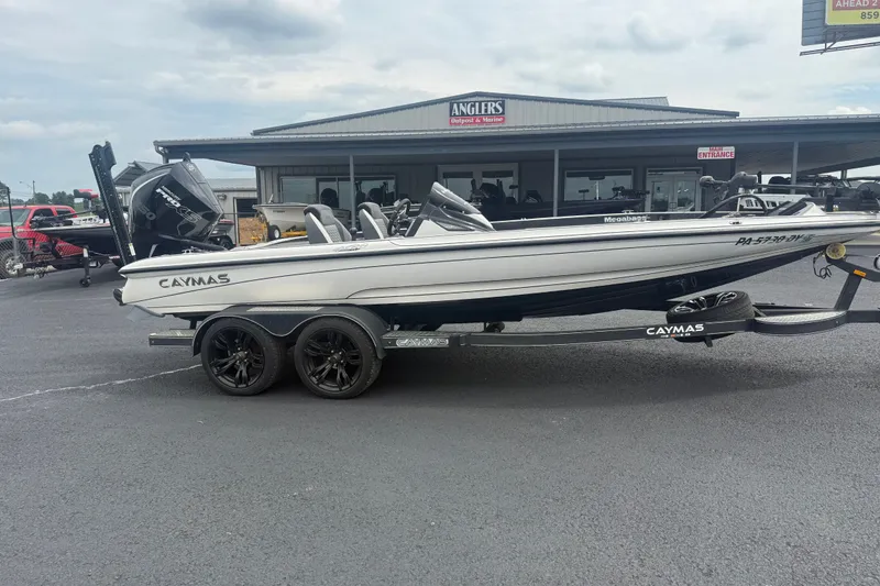 Slide: The Image of 2020 Caymas CX 20 PRO boat on trailer outside Anglers Outpost & Marine. - 2